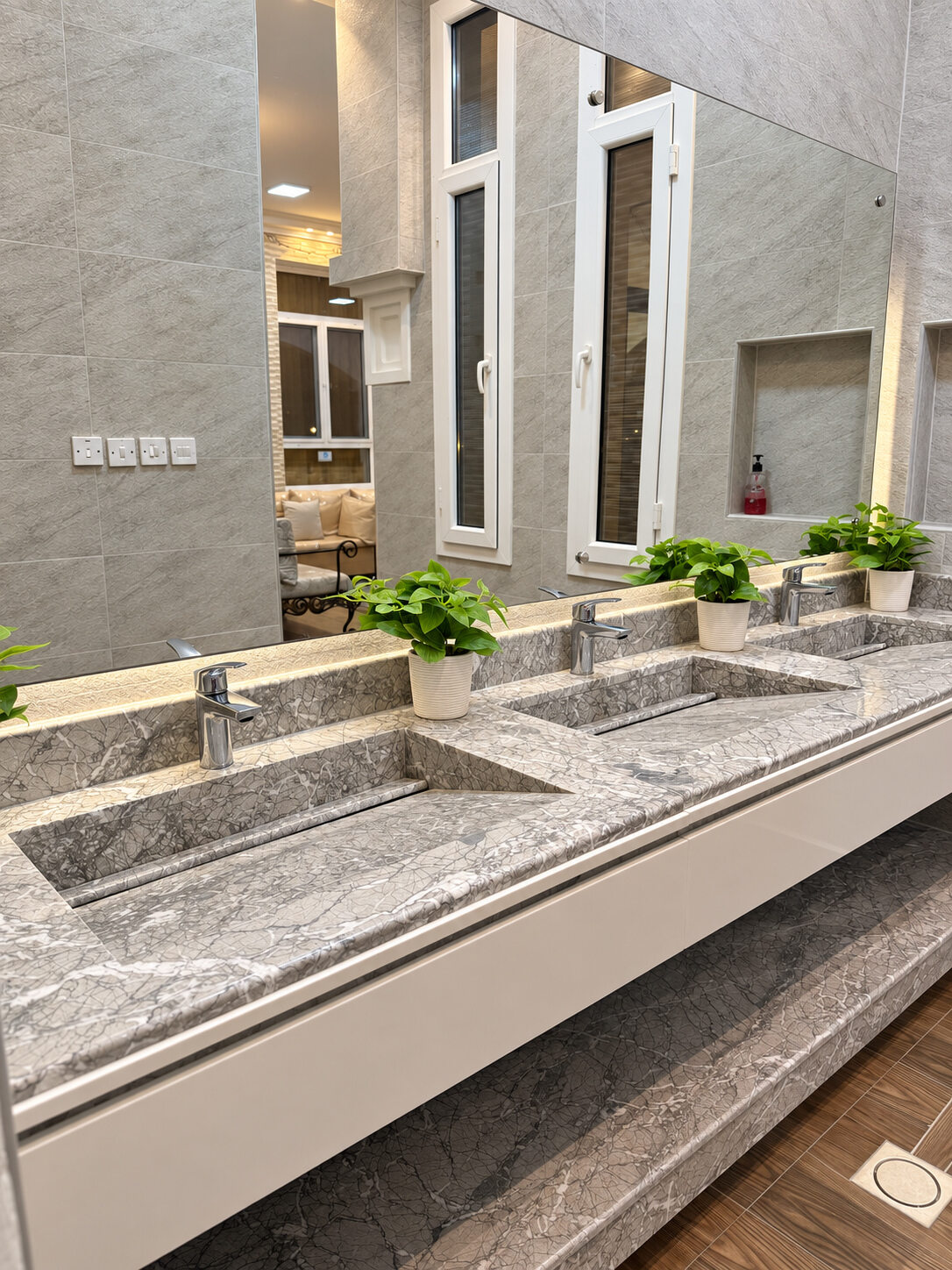 Bathroom washbasins and mirrors at Smart Chalet