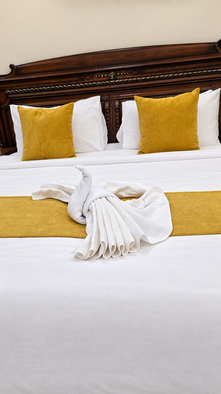 Towel arrangement on the double bed at Smart Chalet